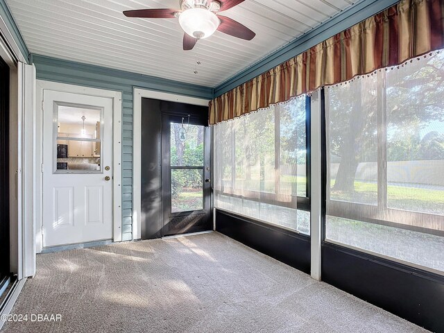 111 Grey Branch Rd, Port Orange, FL 32128 - unfurnished sunroom featuring a ceiling fan