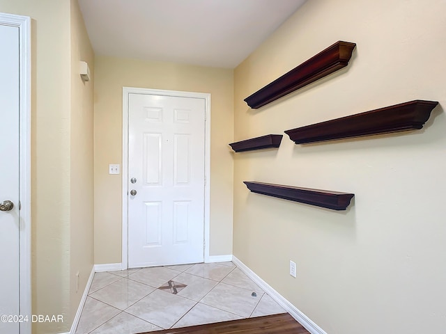 111 Grey Branch Rd, Port Orange, FL 32128 - foyer featuring baseboards and light tile patterned flooring