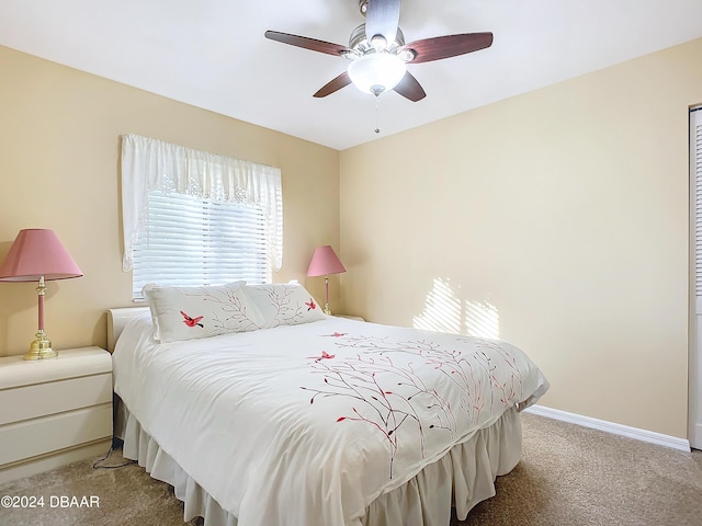 111 Grey Branch Rd, Port Orange, FL 32128 - carpeted bedroom with baseboards and a ceiling fan