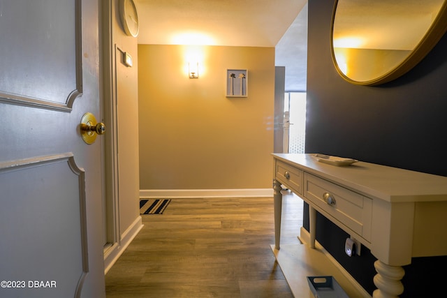 hallway featuring dark hardwood / wood-style flooring