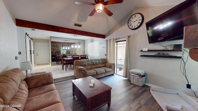 167 Fox Glen Ct, Ormond Beach, FL 32174 - living room with hardwood / wood-style floors, vaulted ceiling, a barn door, and ceiling fan