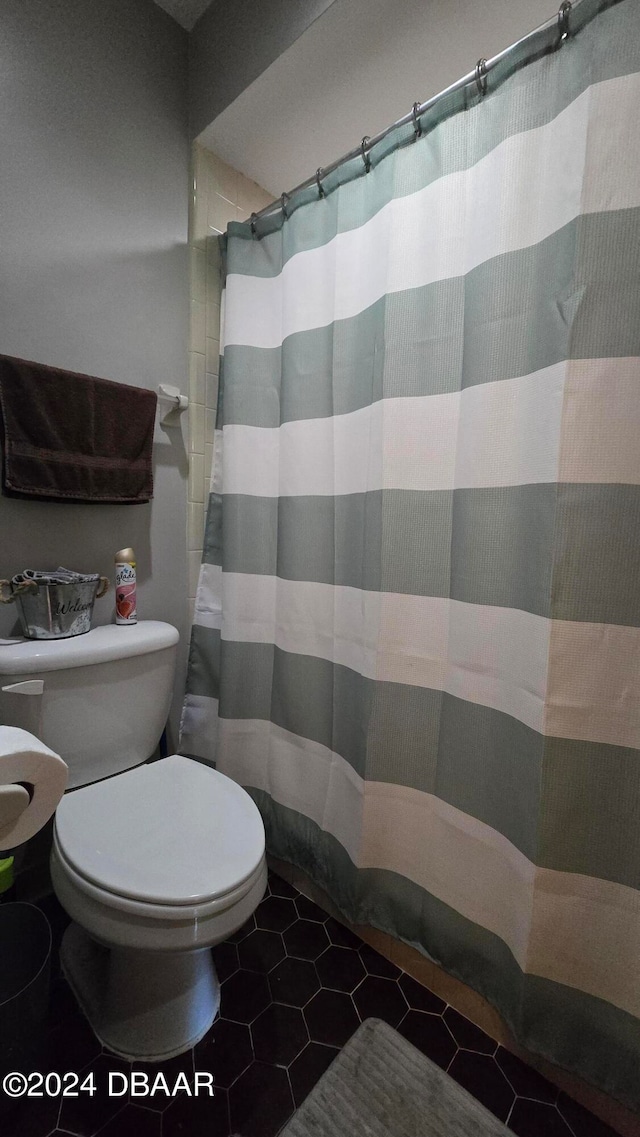 167 Fox Glen Ct, Ormond Beach, FL 32174 - bathroom featuring toilet and tile patterned floors