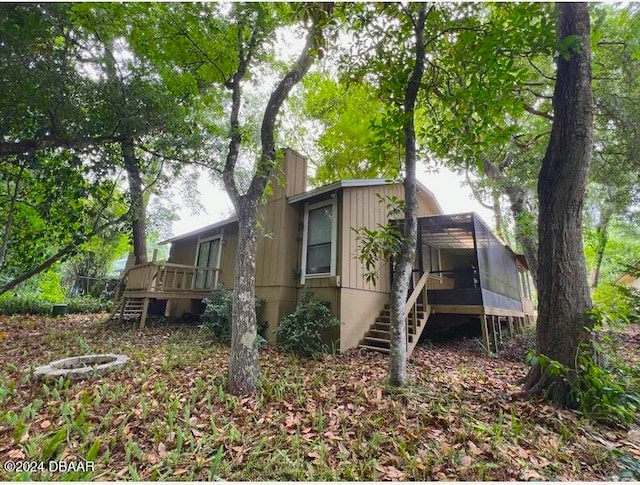 167 Fox Glen Ct, Ormond Beach, FL 32174 - view of property exterior with a wooden deck