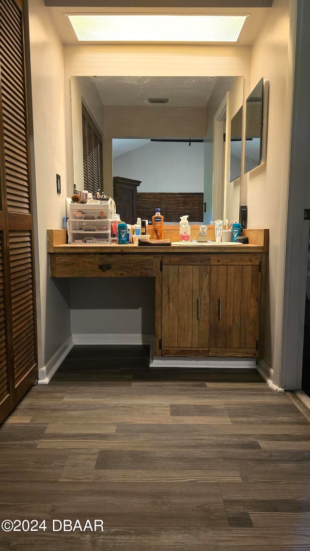 167 Fox Glen Ct, Ormond Beach, FL 32174 - bathroom featuring vanity and wood-type flooring