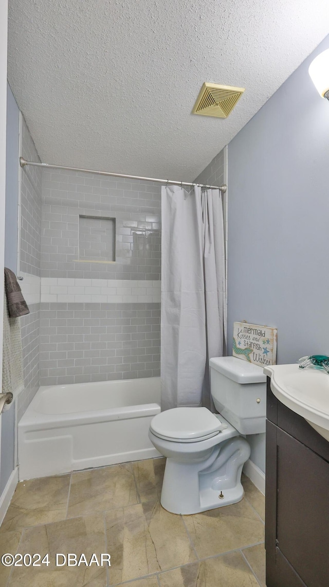 full bath with a textured ceiling, toilet, vanity, visible vents, and shower / bath combo with shower curtain