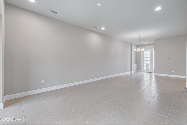 136 Longridge Ln, Ormond Beach, FL 32174 - empty room featuring a chandelier, recessed lighting, light tile patterned flooring, and baseboards