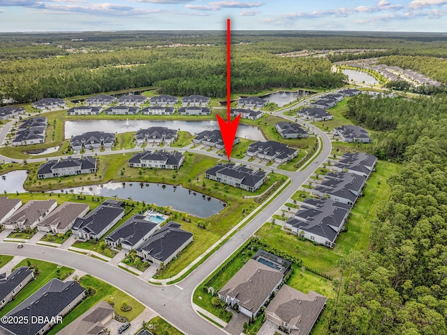 136 Longridge Ln, Ormond Beach, FL 32174 - aerial view of property and surrounding area with a forest, a nearby body of water, and nearby suburban area