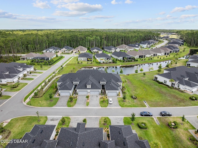 136 Longridge Ln, Ormond Beach, FL 32174 - aerial perspective of suburban area with a large body of water and a forest
