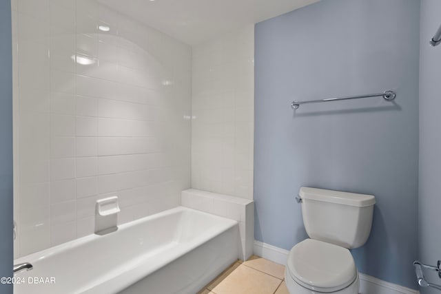 bathroom featuring tile patterned flooring and toilet