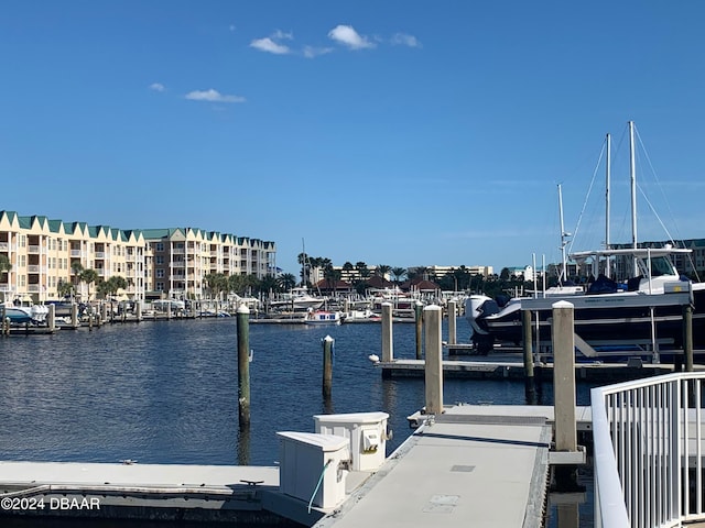 dock area featuring a water view