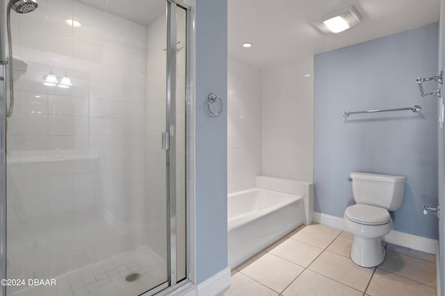 bathroom with tile patterned flooring, toilet, and independent shower and bath