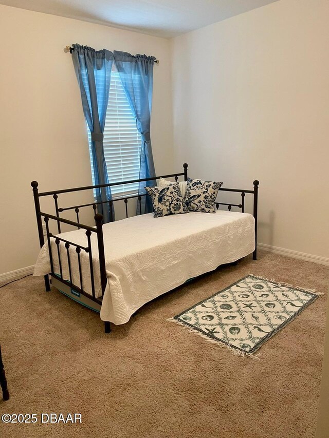 119 Fishermans Cove Dr, Edgewater, FL 32141 - bedroom featuring carpet flooring and baseboards
