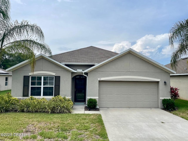 119 Fishermans Cove Dr, Edgewater, FL 32141 - single story home featuring an attached garage, stucco siding, driveway, and a front yard