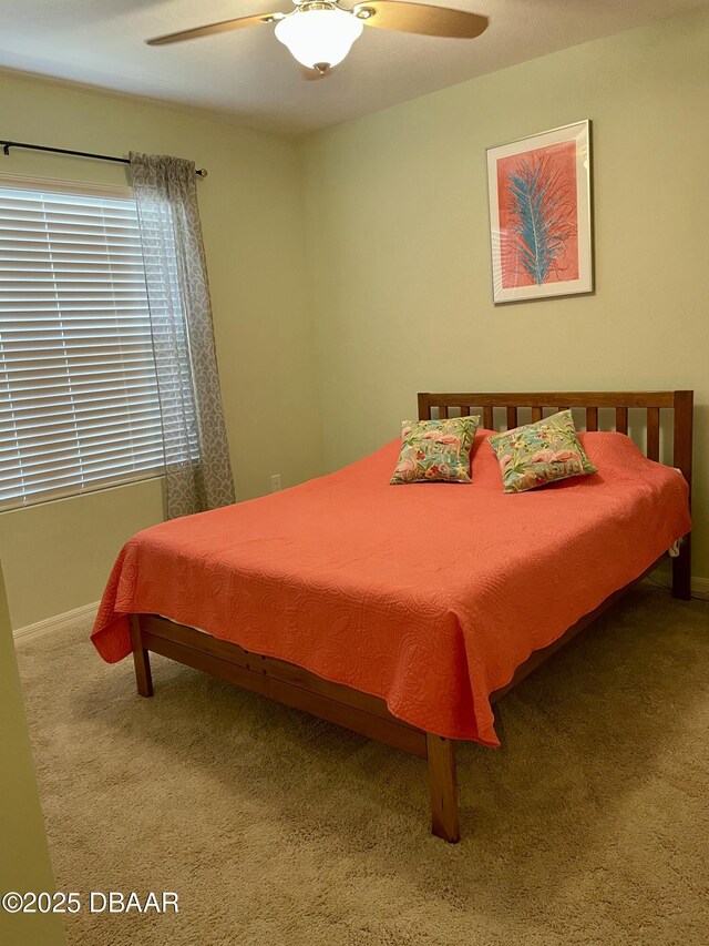 119 Fishermans Cove Dr, Edgewater, FL 32141 - bedroom with carpet, baseboards, and a ceiling fan