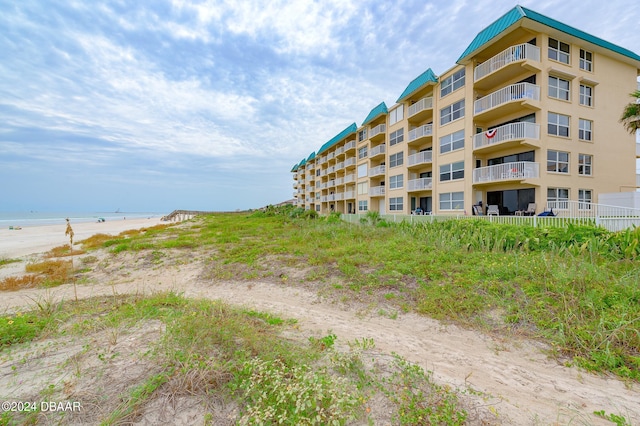 view of building exterior featuring a water view