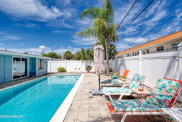 view of pool featuring a patio area