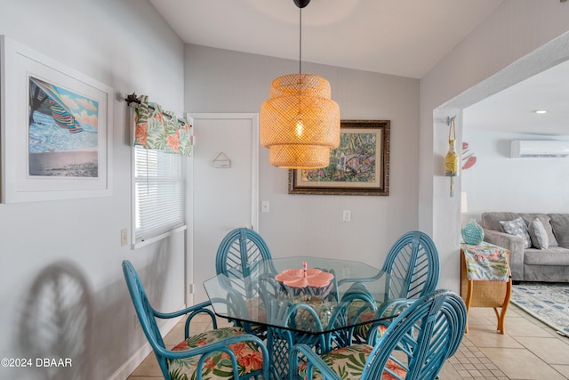 tiled dining area featuring an AC wall unit and vaulted ceiling