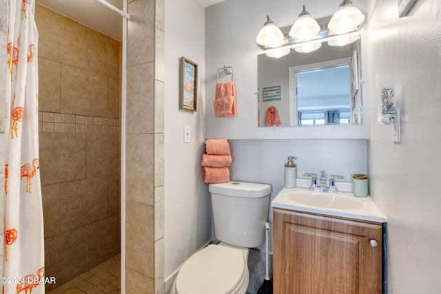 bathroom with toilet, vanity, and a shower with shower curtain