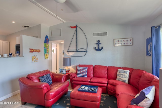 living room featuring light tile patterned floors, ceiling fan, and lofted ceiling