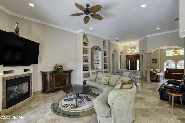 3 Indian Springs Dr, Ormond Beach, FL 32174 - living area with arched walkways, light marble finish floors, recessed lighting, a ceiling fan, and built in features