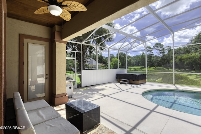 3 Indian Springs Dr, Ormond Beach, FL 32174 - outdoor pool featuring a hot tub, a patio, a lanai, and a ceiling fan