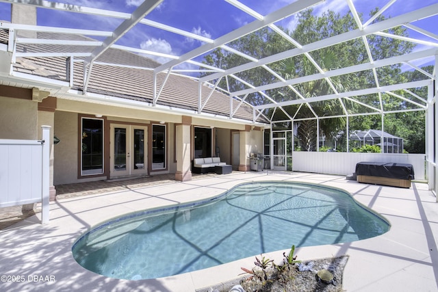 3 Indian Springs Dr, Ormond Beach, FL 32174 - view of swimming pool with french doors, a hot tub, a patio, and outdoor lounge area