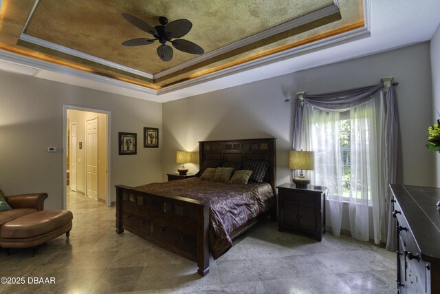 3 Indian Springs Dr, Ormond Beach, FL 32174 - bedroom with a tray ceiling, ornamental molding, and ceiling fan