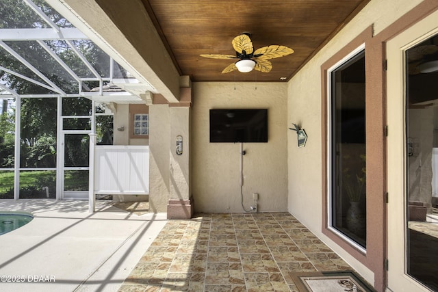 3 Indian Springs Dr, Ormond Beach, FL 32174 - view of patio / terrace with a ceiling fan and glass enclosure