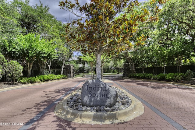 3 Indian Springs Dr, Ormond Beach, FL 32174 - view of decorative street with curbs and a gated entry