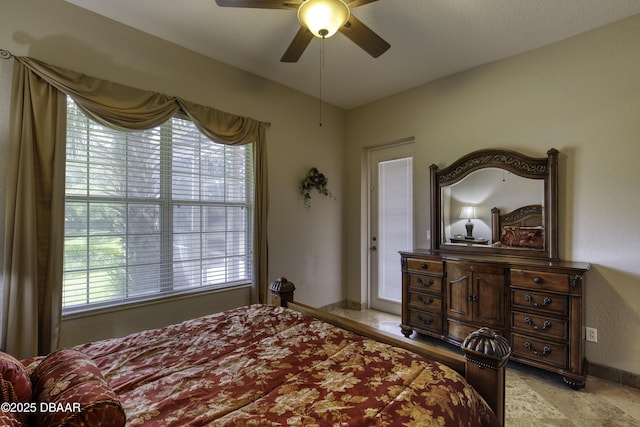 3 Indian Springs Dr, Ormond Beach, FL 32174 - bedroom with a ceiling fan and baseboards