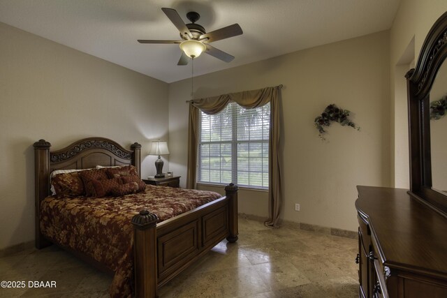 3 Indian Springs Dr, Ormond Beach, FL 32174 - bedroom with baseboards and ceiling fan