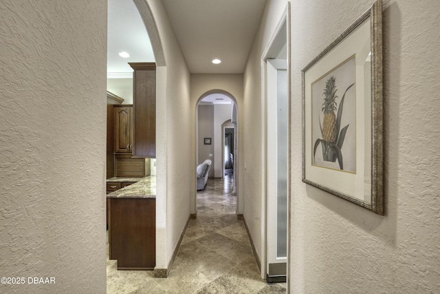 3 Indian Springs Dr, Ormond Beach, FL 32174 - hall with a textured wall, arched walkways, and recessed lighting