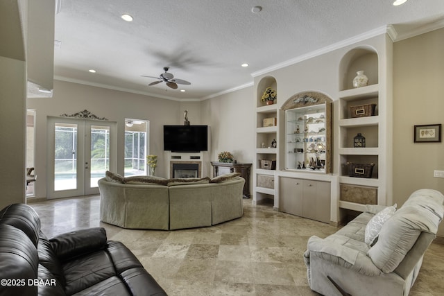 3 Indian Springs Dr, Ormond Beach, FL 32174 - living room featuring built in features, ceiling fan, recessed lighting, french doors, and a textured ceiling