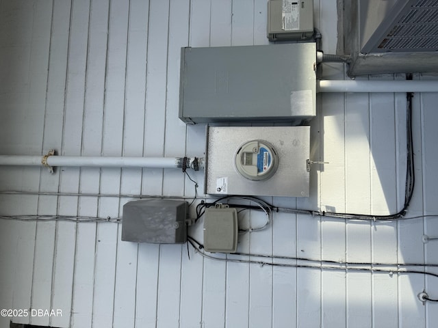 details with electric meter and board and batten siding