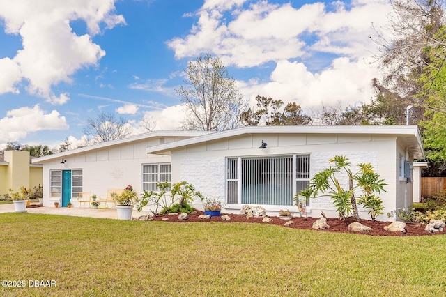 view of front of house with a front yard