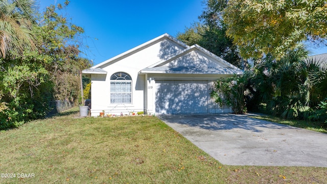 ranch-style house with a front yard and a garage