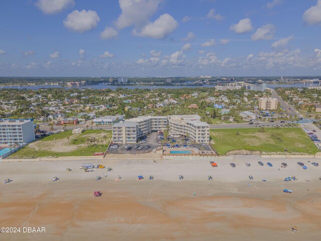 1233 S Atlantic Ave Unit 1040, Daytona Beach, FL 32118 - bird's eye view featuring a water view, a city view, and a view of the beach