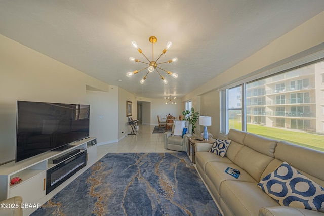 tiled living room featuring a chandelier