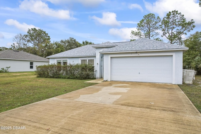 single story home with a garage and a front yard