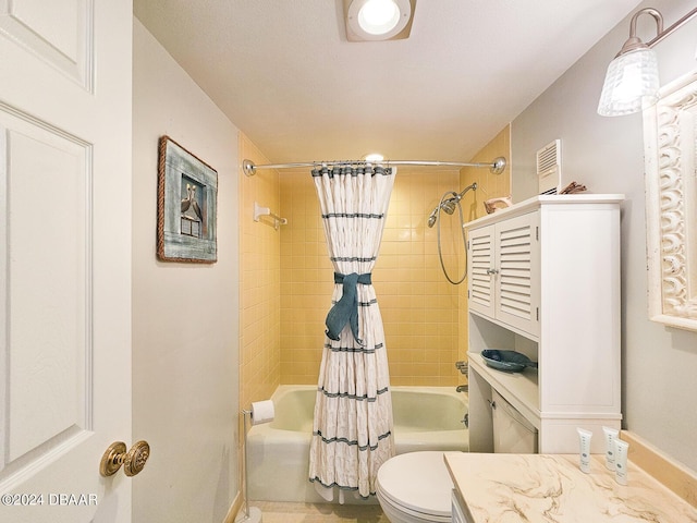 3606 S Peninsula Dr Unit 614, Port Orange, FL 32127 - full bathroom featuring shower / bathtub combination with curtain, toilet, baseboards, and vanity