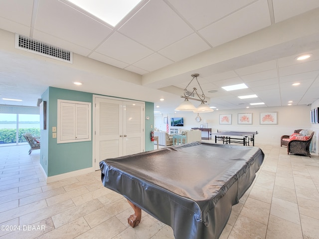 playroom with a drop ceiling and billiards