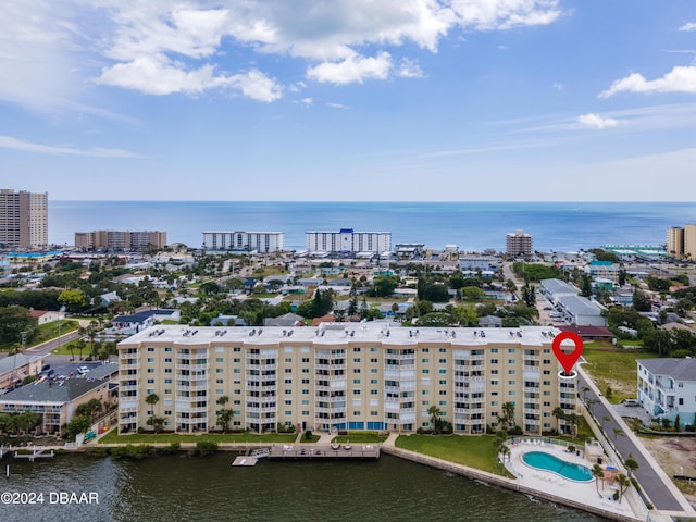 3606 S Peninsula Dr Unit 614, Port Orange, FL 32127 - aerial view of a nearby body of water, a pool, and apartment complex