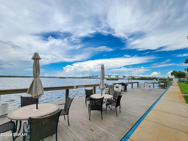 view of dock with a water view