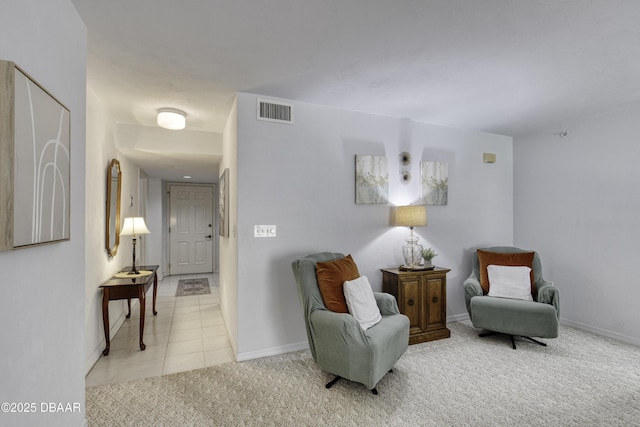 1 John Anderson Dr Unit 317, Ormond Beach, FL 32176 - sitting room with baseboards and light carpet
