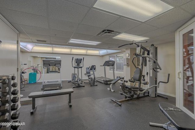 1 John Anderson Dr Unit 317, Ormond Beach, FL 32176 - exercise room with a drop ceiling and baseboards