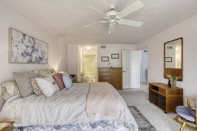 1 John Anderson Dr Unit 317, Ormond Beach, FL 32176 - bedroom featuring carpet flooring, ensuite bathroom, and a ceiling fan