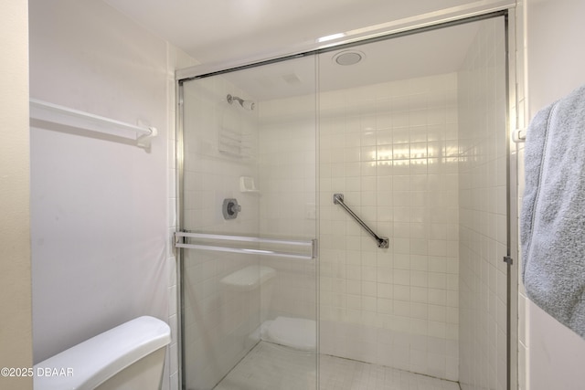1 John Anderson Dr Unit 317, Ormond Beach, FL 32176 - bathroom featuring toilet and tiled shower