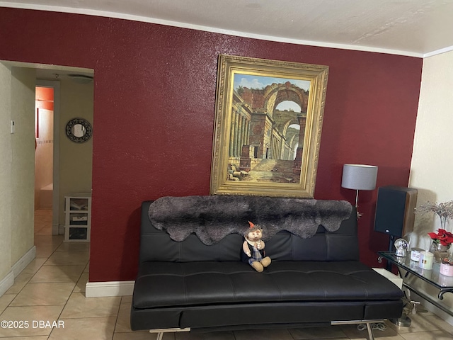 4250 SW 67th Ave Unit 32, Miami, FL 33155 - living room featuring light tile patterned floors, baseboards, and a textured wall