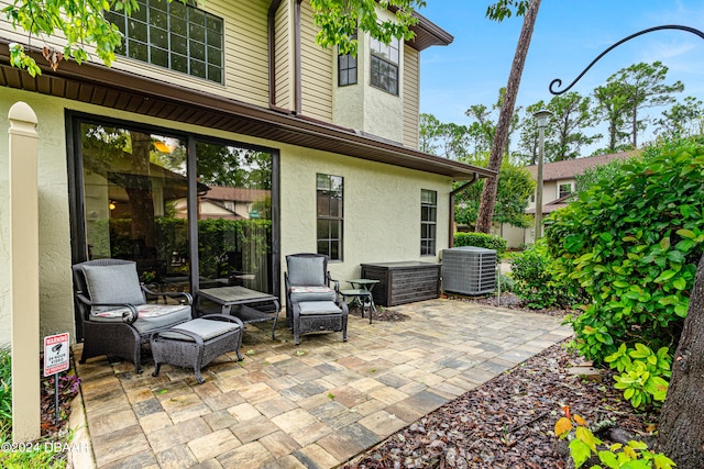 view of patio / terrace with central air condition unit