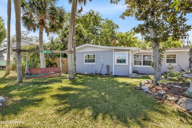 view of front of home with a front yard